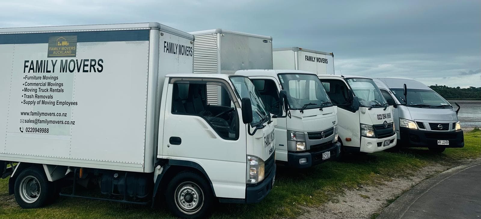 Family Movers truck fleet lined up outdoors